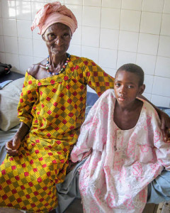 Ali Kabia, 9, with his grandmother, recovering from hernia surgery at Holy Spirit Hospital - January 2014.